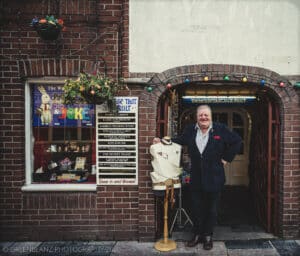Man standing in front of shop